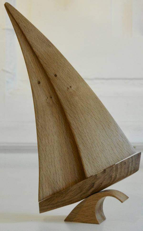 - a Sculpture by Kevin Longstaff, measuring 33 x 27 cm (H x W) £95